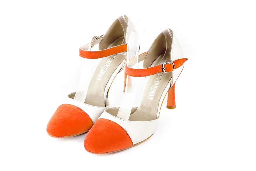 French elegance and refinement for these clementine orange and off white dress open side shoes, with an instep strap, 
                available in many subtle leather and colour combinations. Its high vamp and fitted strap will give you good support.
To personalize or not, according to your inspiration and your needs.  
                Matching clutches for parties, ceremonies and weddings.   
                You can customize these shoes to perfectly match your tastes or needs, and have a unique model.  
                Choice of leathers, colours, knots and heels. 
                Wide range of materials and shades carefully chosen.  
                Rich collection of flat, low, mid and high heels.  
                Small and large shoe sizes - Florence KOOIJMAN